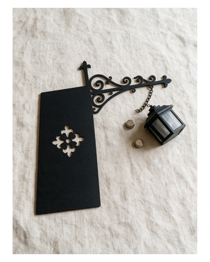 What is in the box: lantern bracket and button cell batteries
