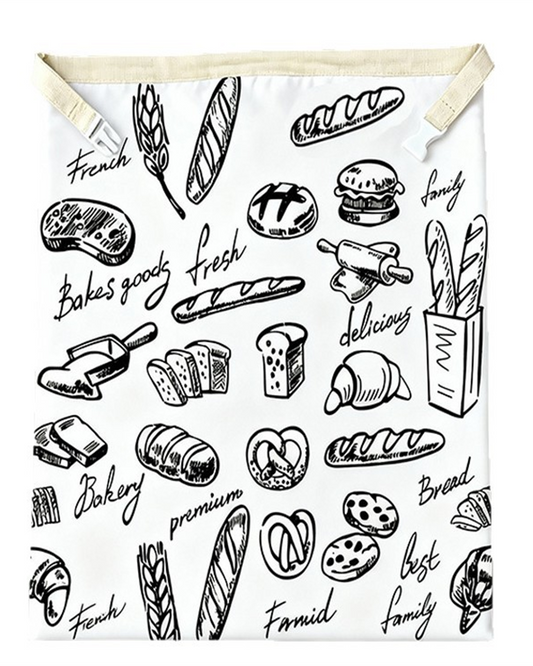 Bakery Doodle beeswax bread bag — black ink bakery drawings and handwritten words on white cotton, cream band and white side-release buckles