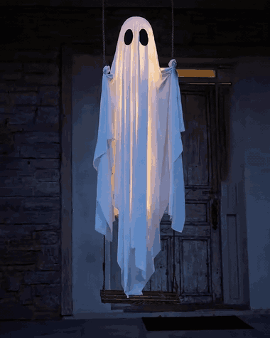 The swing ghost swaying and glowing at night