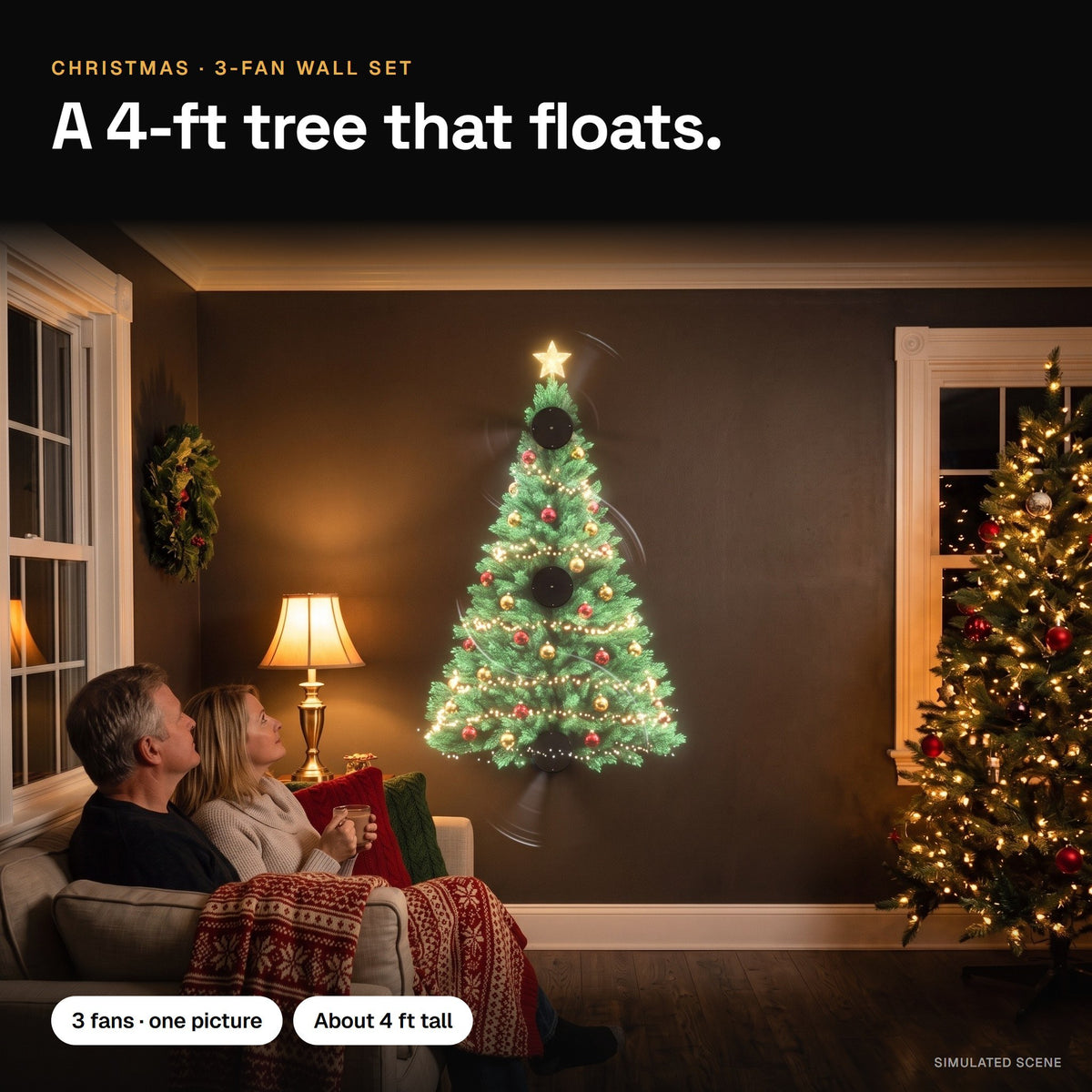 Three hologram fans on a living-room wall make one 4-ft Christmas tree while a couple watches from the sofa