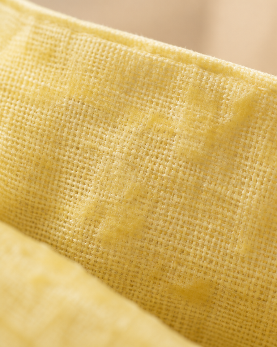 Macro of the lining showing beeswax soaked into the cotton weave