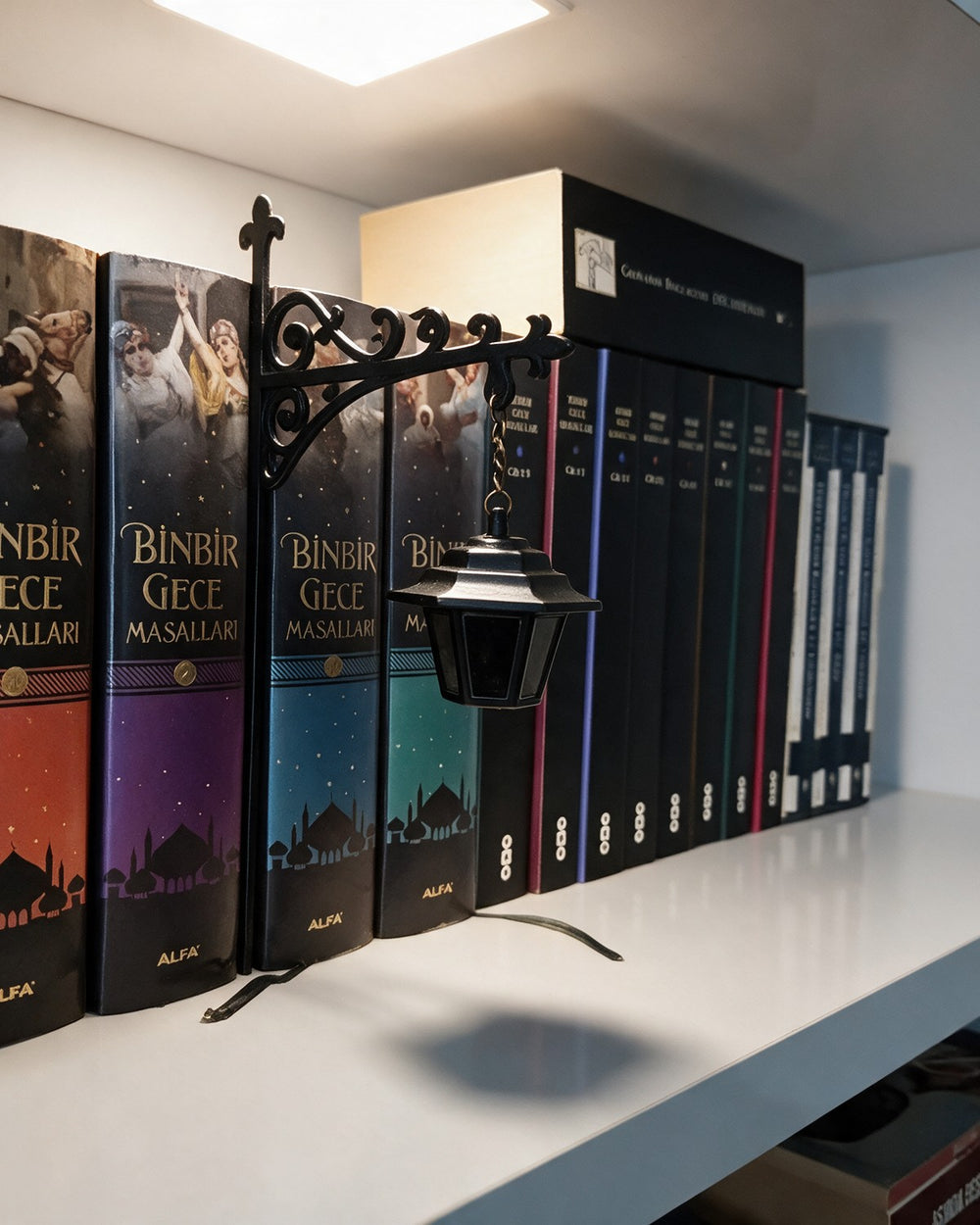The same shelf under an ordinary ceiling light with the lantern switched off